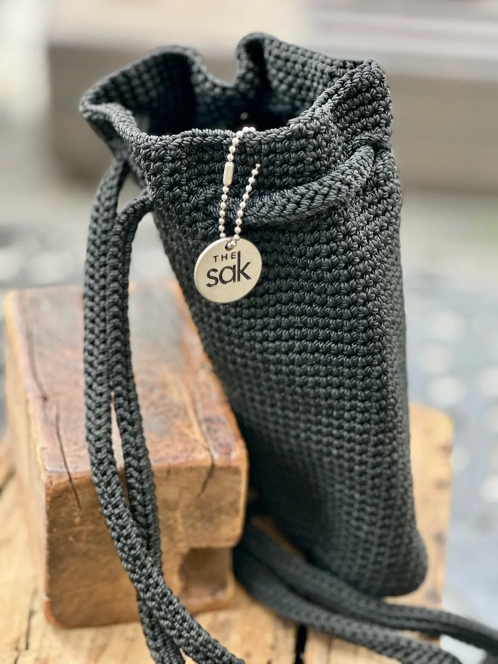 The Sak Black Crochet Bucket Bag Drawstring Crossbody Boho Backpack Purse